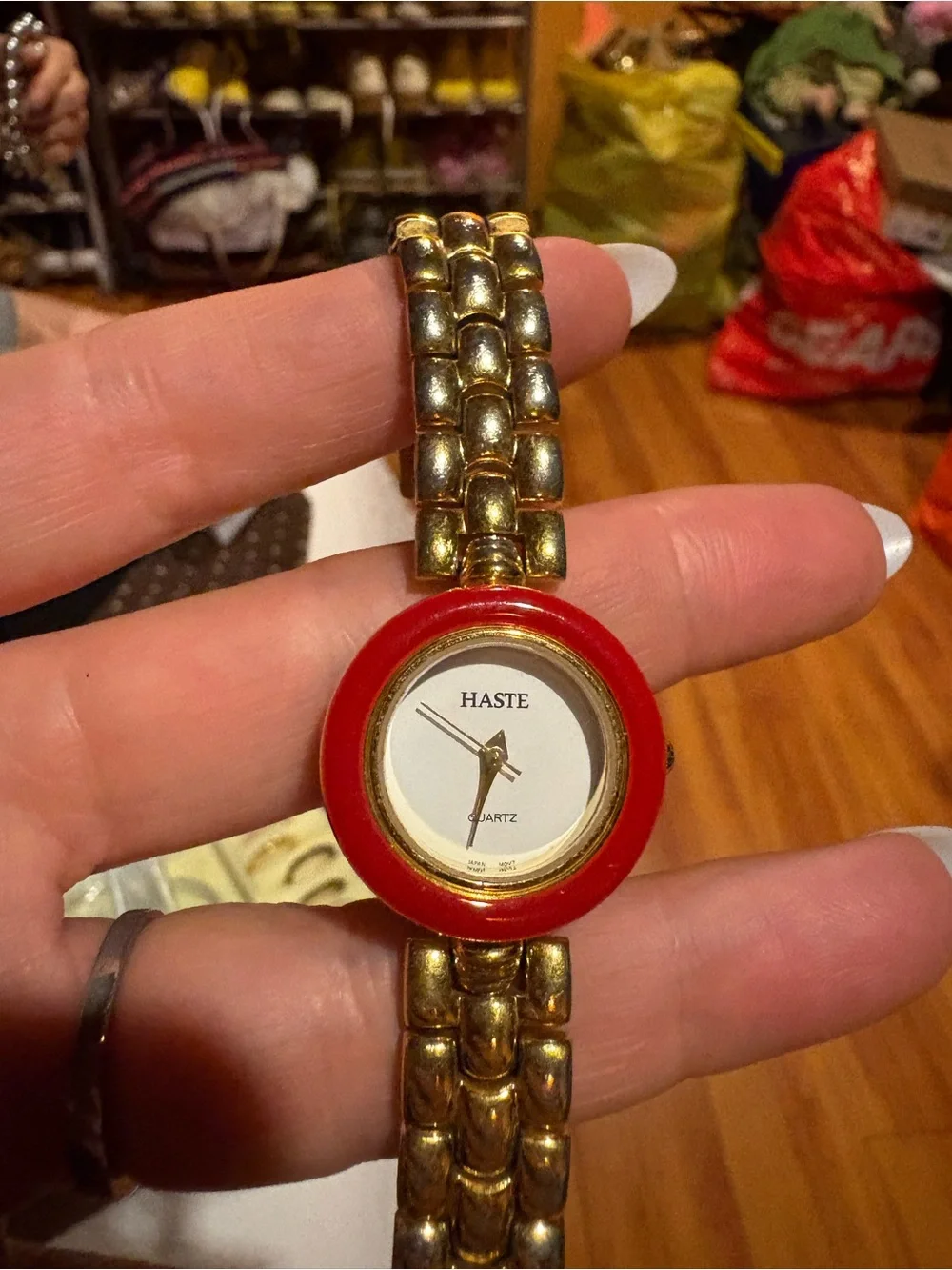 Haste Gold Tone Wrap Watch with Red Accent